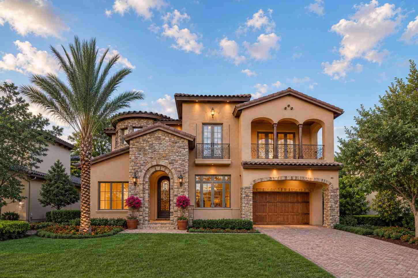 Front Elevation of 3 Bedroom 2 Story Mediterranean House Plan with Rotunda and Home Theater